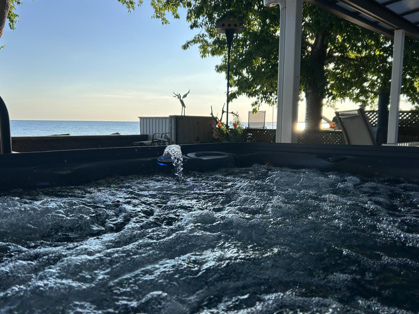 Unwind in the hot tub with Lake Erie as your backdrop.