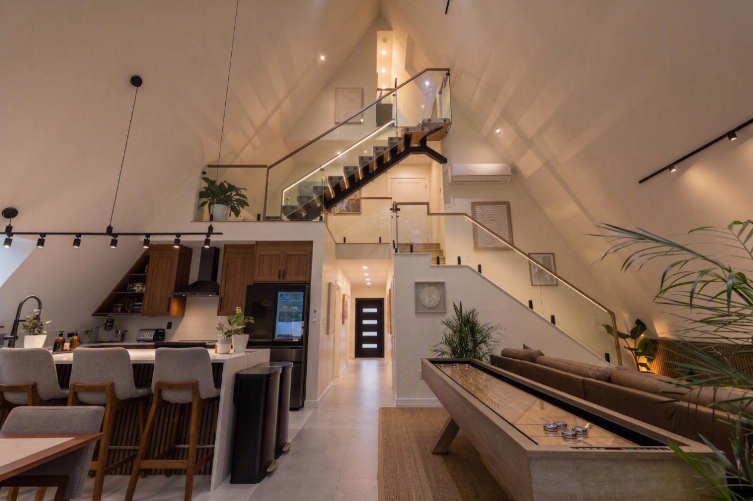 Kitchen below, loft above, stairs between