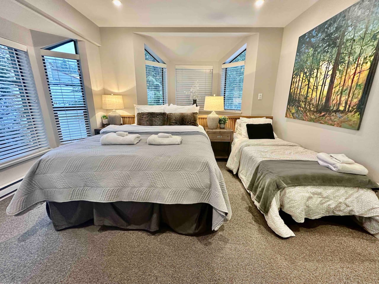 Bedroom #1 w/ EXTRA Twin Bed Set Up.  **Must be requested in advance**
One Twin bed can be added to existing bedroom #1 configuration.  *Note addition of extra twin bed does not change Max Occupancy Limit.