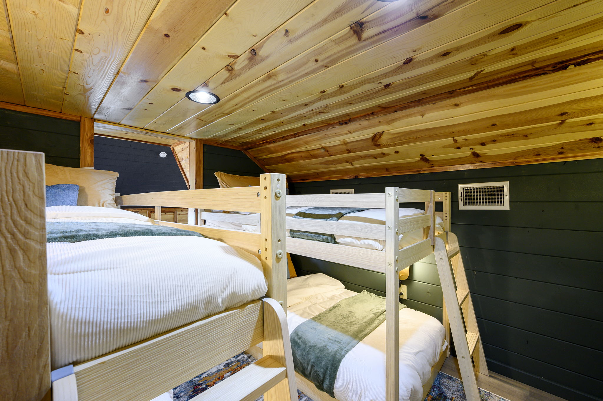 A versatile loft space that offers additional sleeping or lounging options for families and groups.