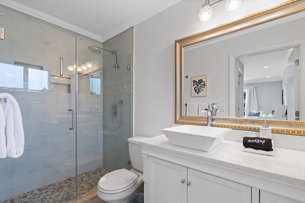 Master Bathroom with pebble floor shower.
