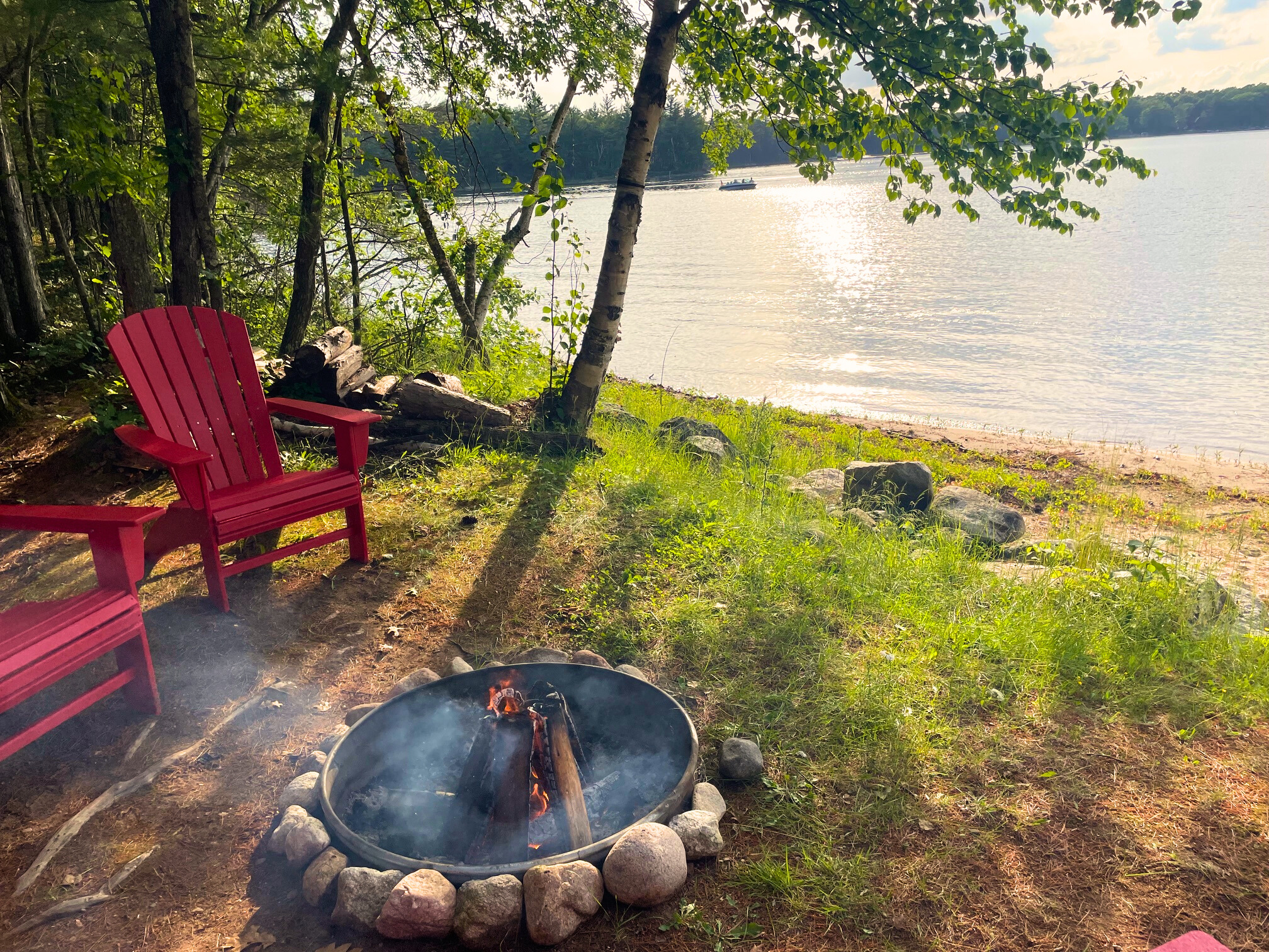 The lakeside fire pit is great place to relax - day or night