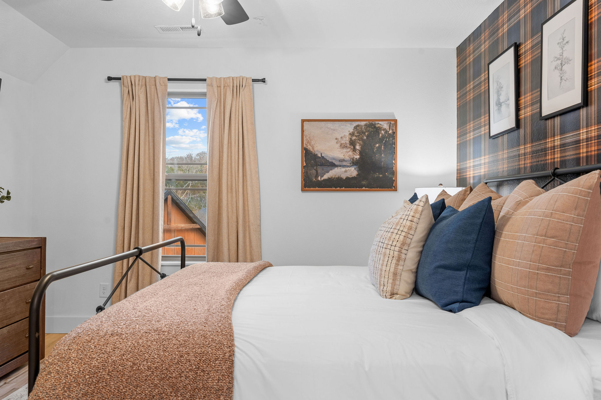 Bright, comfortable bedroom with plenty of natural light.