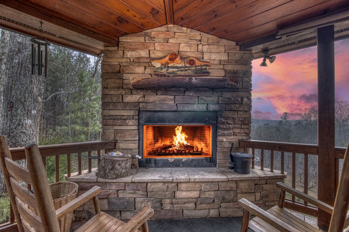 Outdoor wood-burning fireplace on the back deck with mountain views!