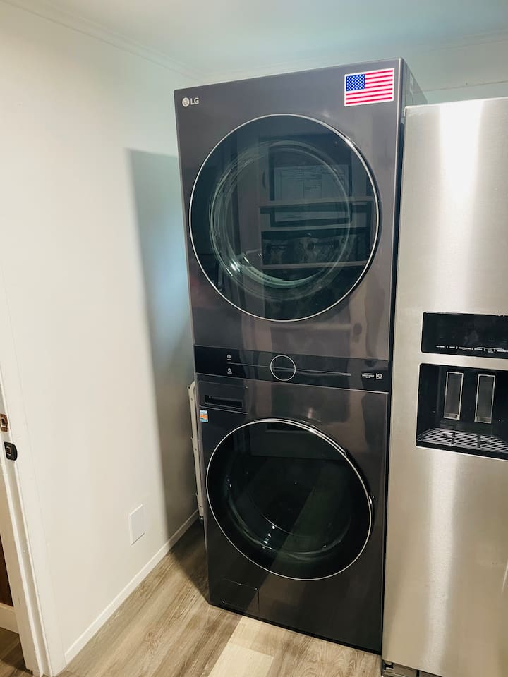 A stacked washer and dryer with a turbo cycle make laundry quick and convenient during your stay.