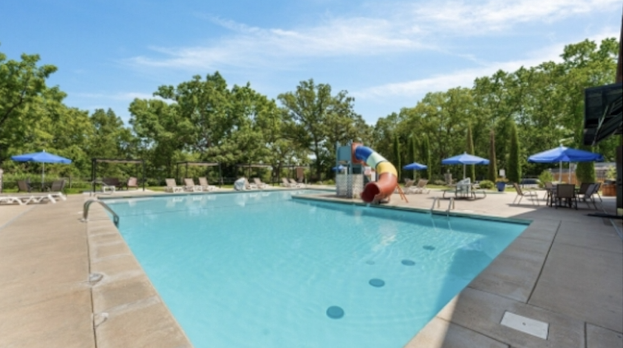 Outdoor resort pool and splash area for unforgettable summer family trips.