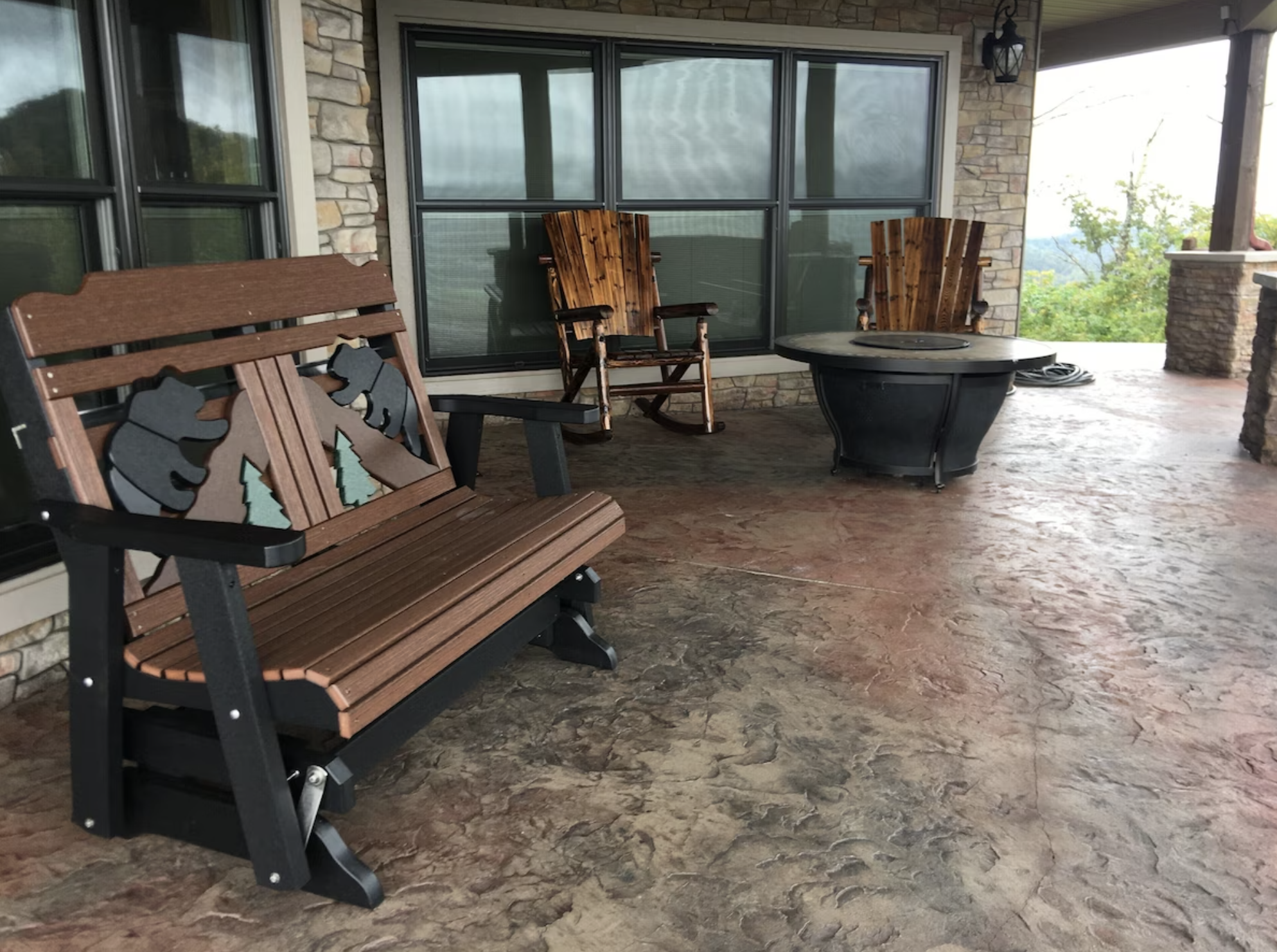 Plenty more seating with rockers and a fire pit on the patio.