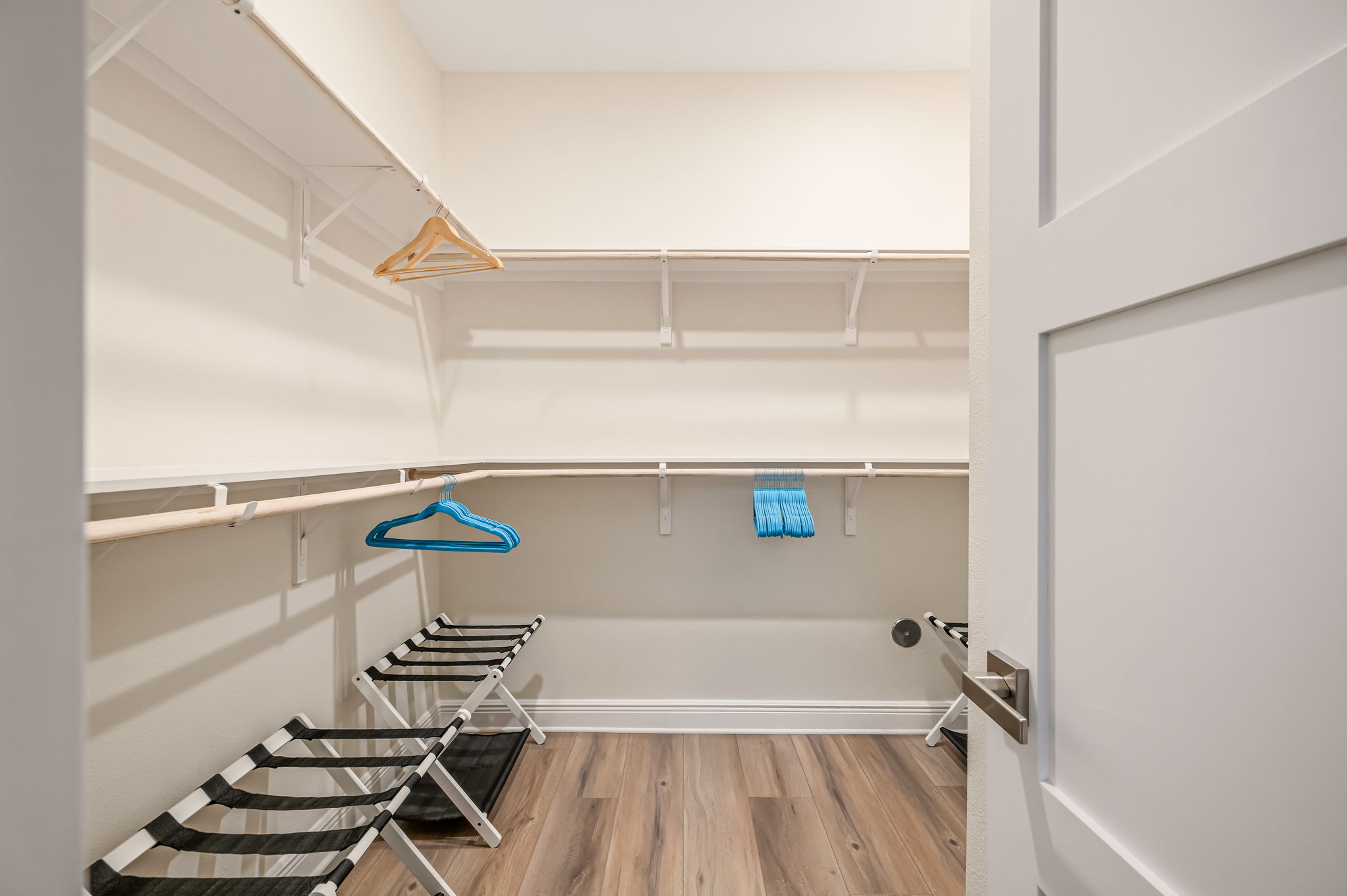 Large walk-in closet with ample storage space for longer stays.