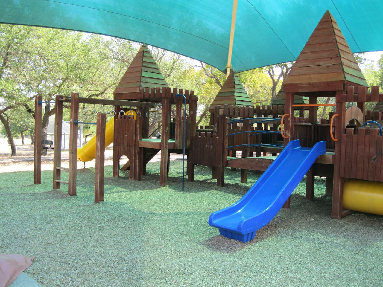 Covered Playscape in Neighborhood Park Is Five Blocks From the House