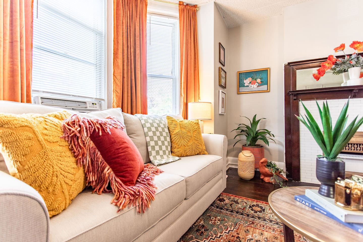 Cozy living area featuring a comfortable couch, perfect for relaxing, reading, or enjoying your favorite shows.