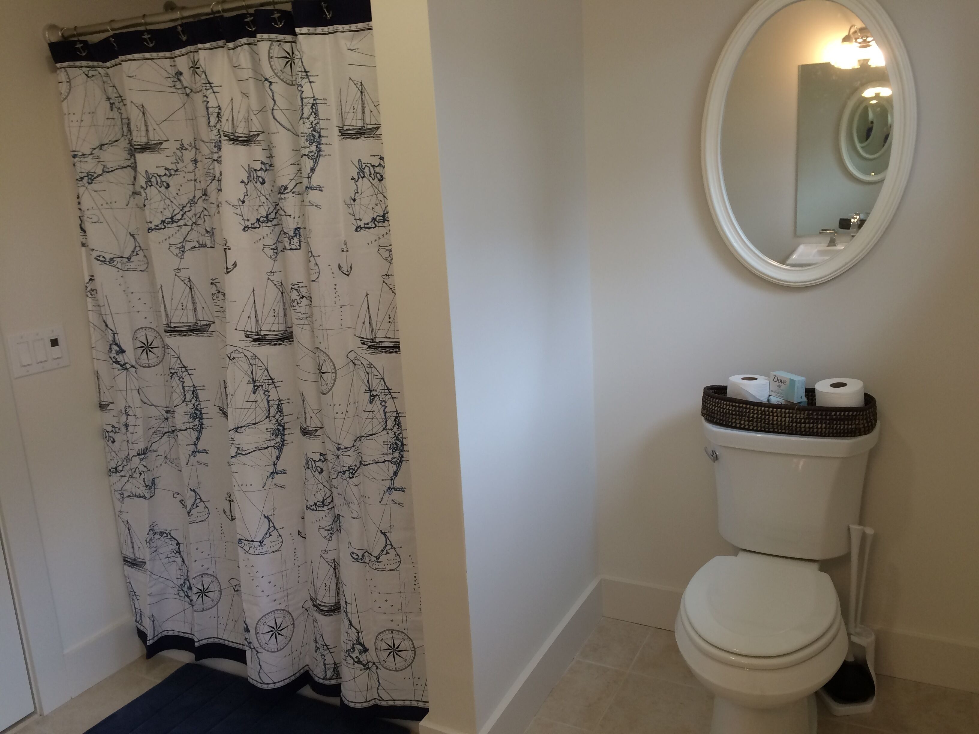 Bathroom off room with three twin beds.