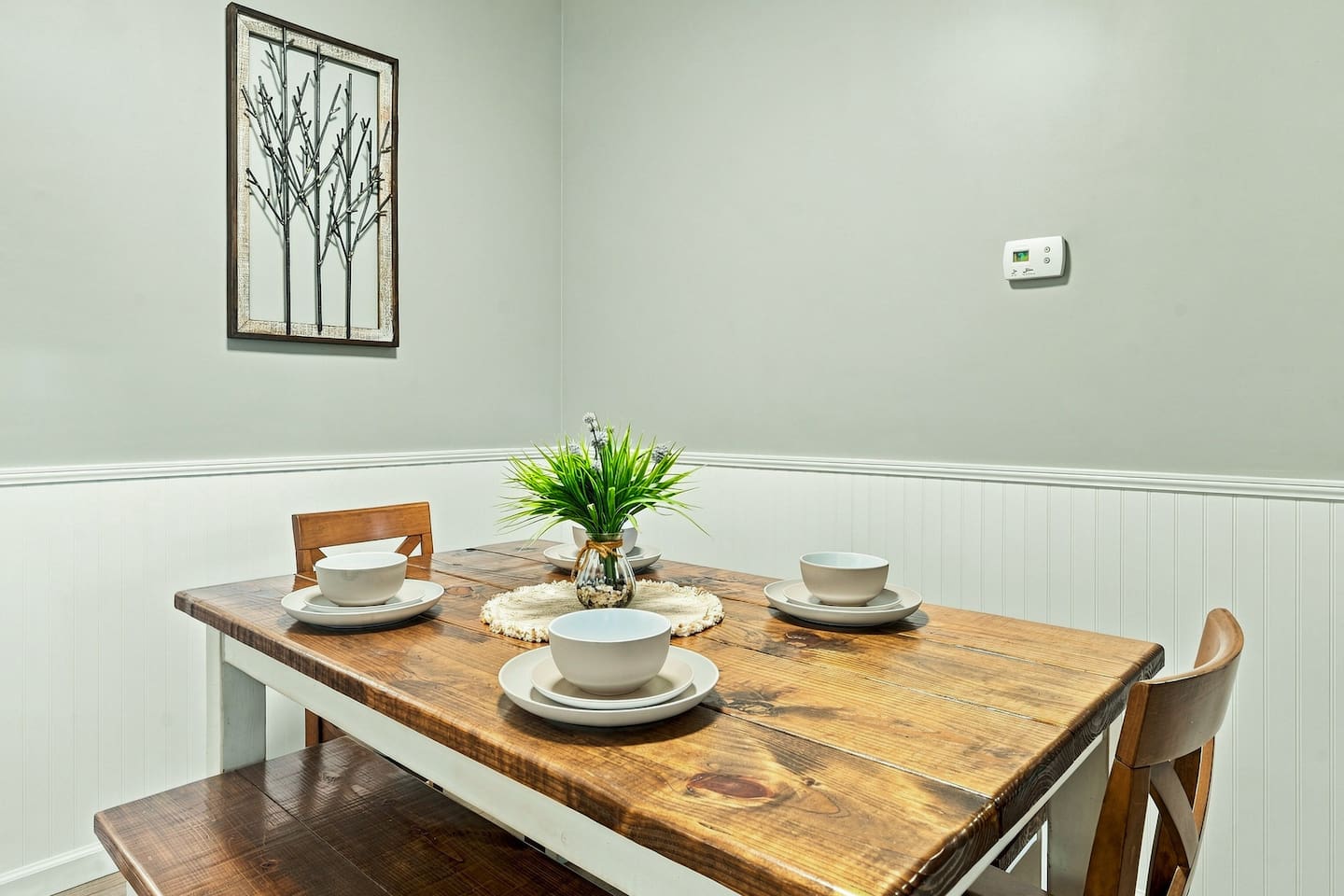 Gather for breakfast, family dinners, or game night around the dining table with seating for 7. Set right beside the kitchen, it’s an easy gathering spot for meals, conversation, and planning the next day’s lake adventures.