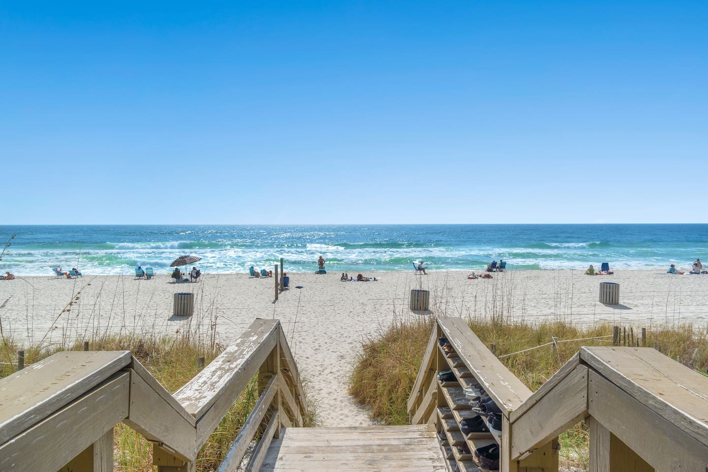 Step out of the condo and onto the sugar-white sands of Panama City Beach—your beachfront escape begins just down this private boardwalk!