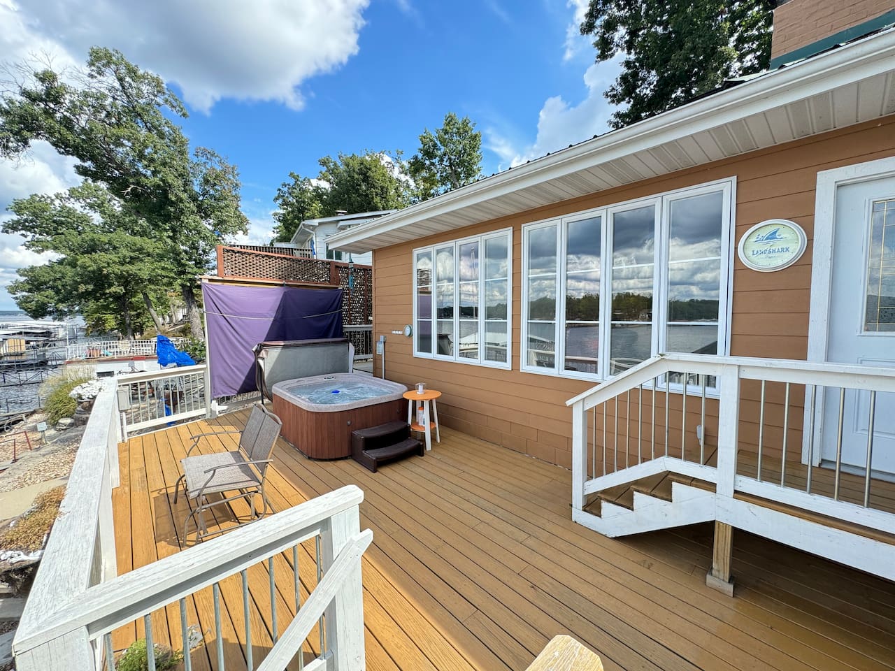 Spacious deck for viewing the lake and enjoying the hot tub. 