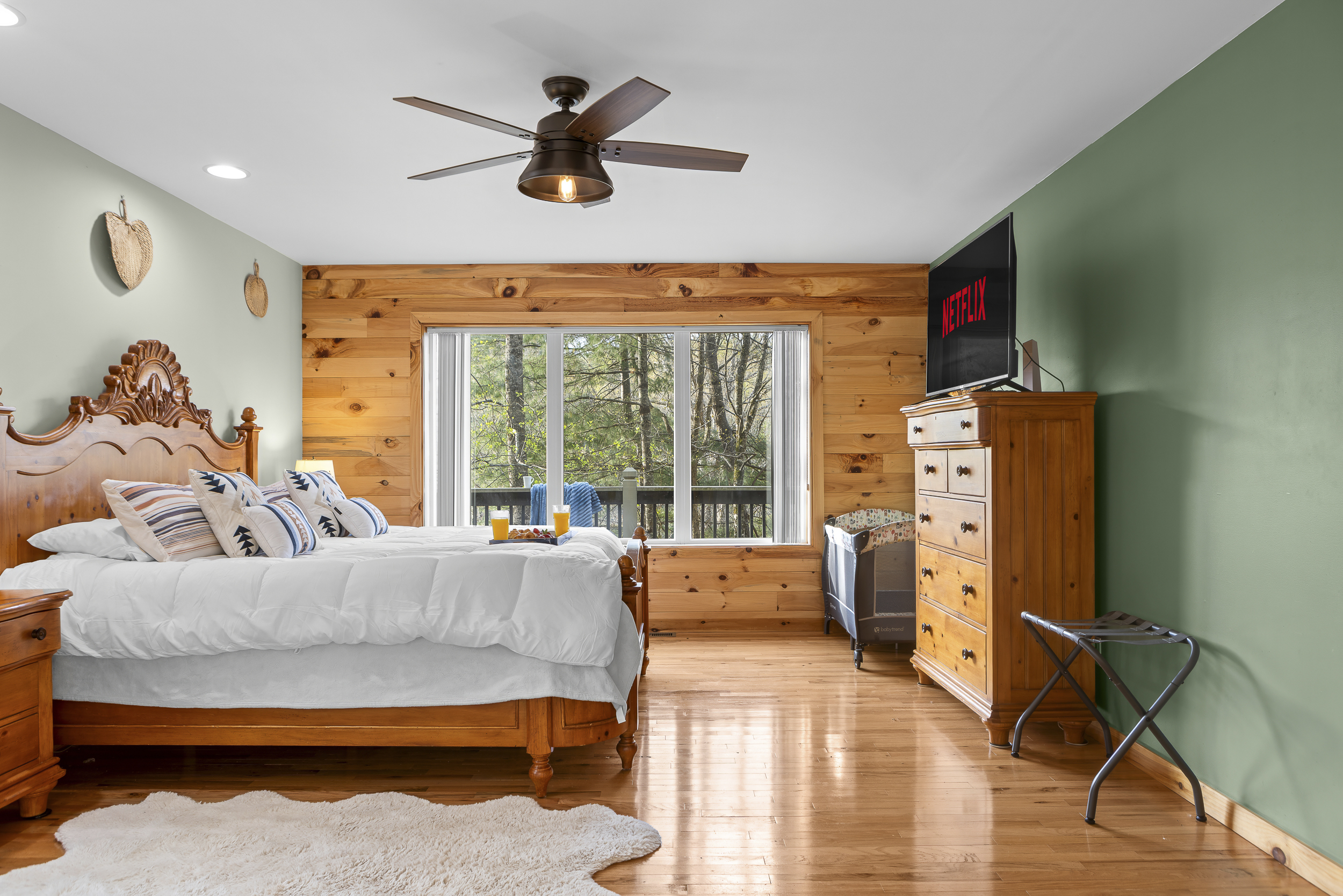 Master King Bedroom 1: Wake up to nature views and enjoy a serene retreat with stylish decor!