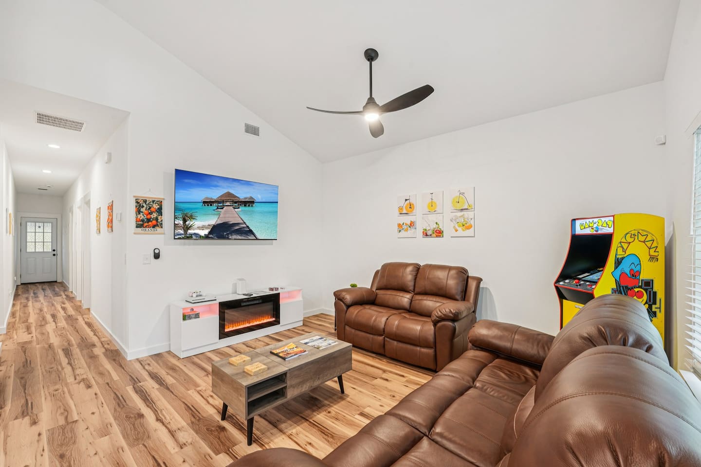 65'' smart wifi TV, xbox series x with games (or login to your own account), electric fireplace, comfortable seating, arcade game.