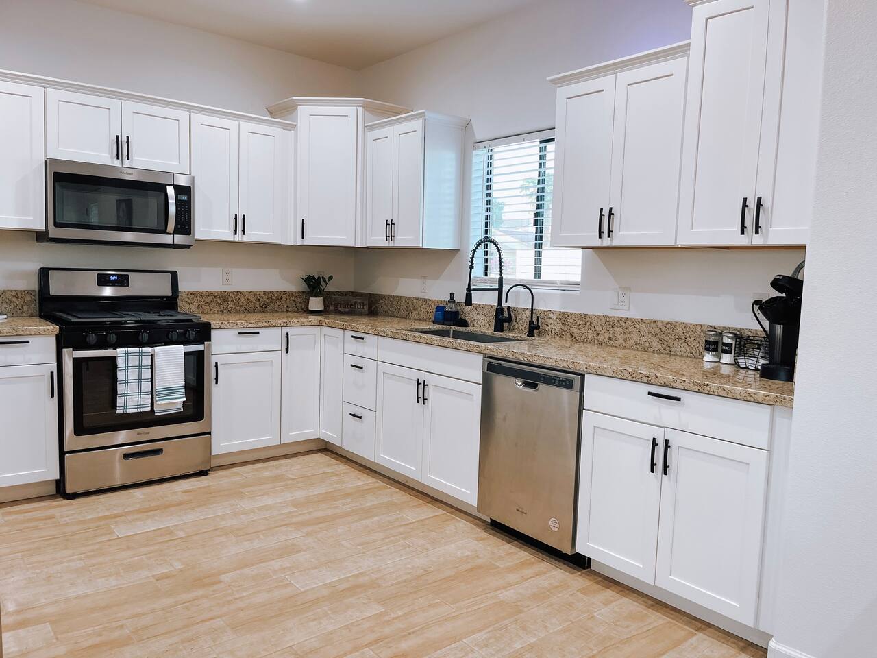 Fully equipped kitchen with modern appliances and ample counter space