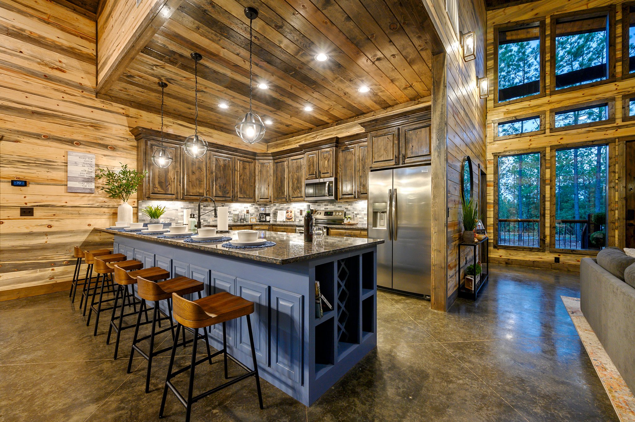 Stunning log cabin kitchen with modern touches and serene woodland views