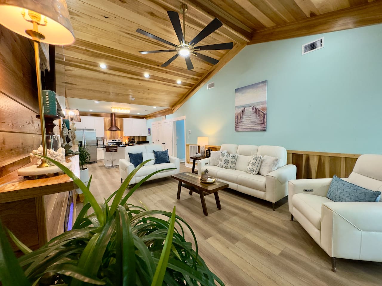Be invited to relax in this open, cheerful living area.