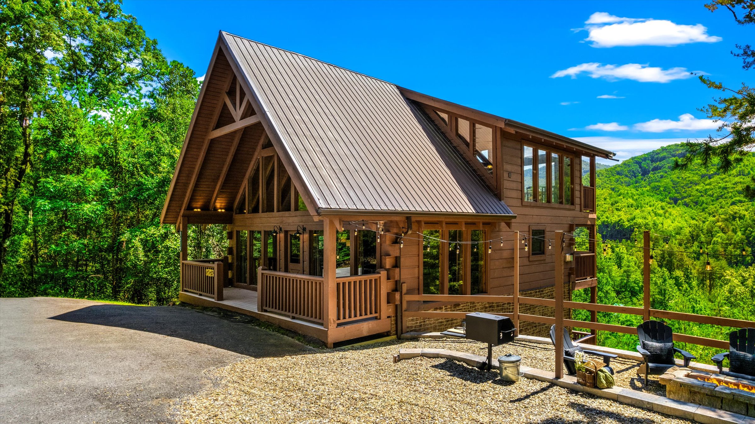 Mountain views, a fire pit, and a grill area make the semi-private driveway the perfect spot to start your getaway.