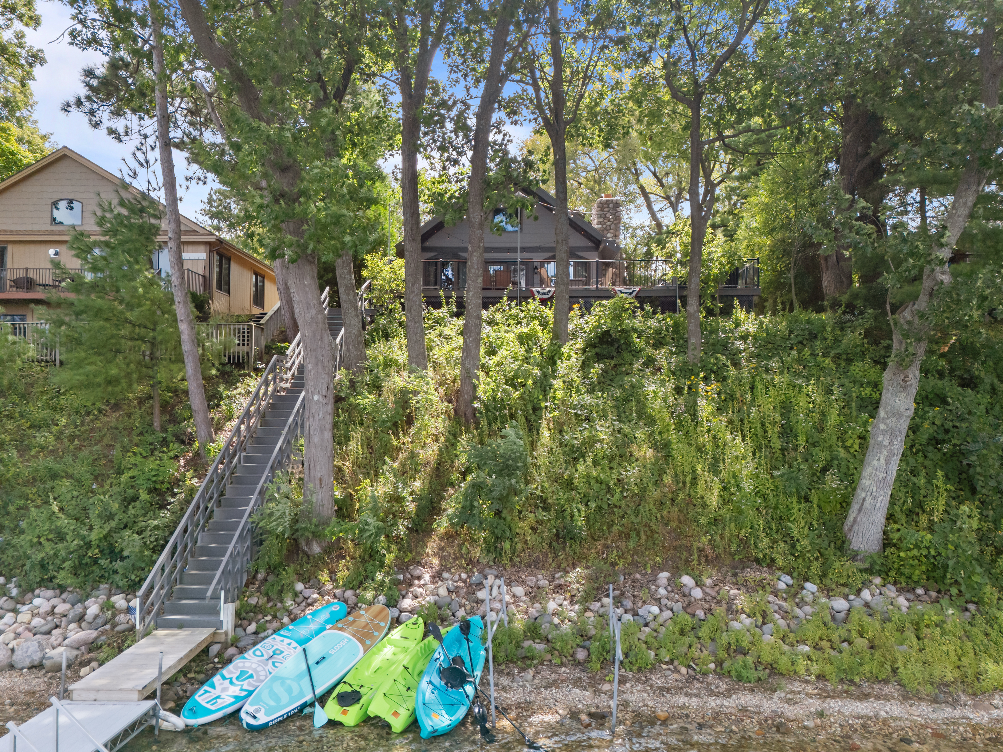 Steps lead you right down to the lake, making it easy to slip in for a swim or launch your next adventure.