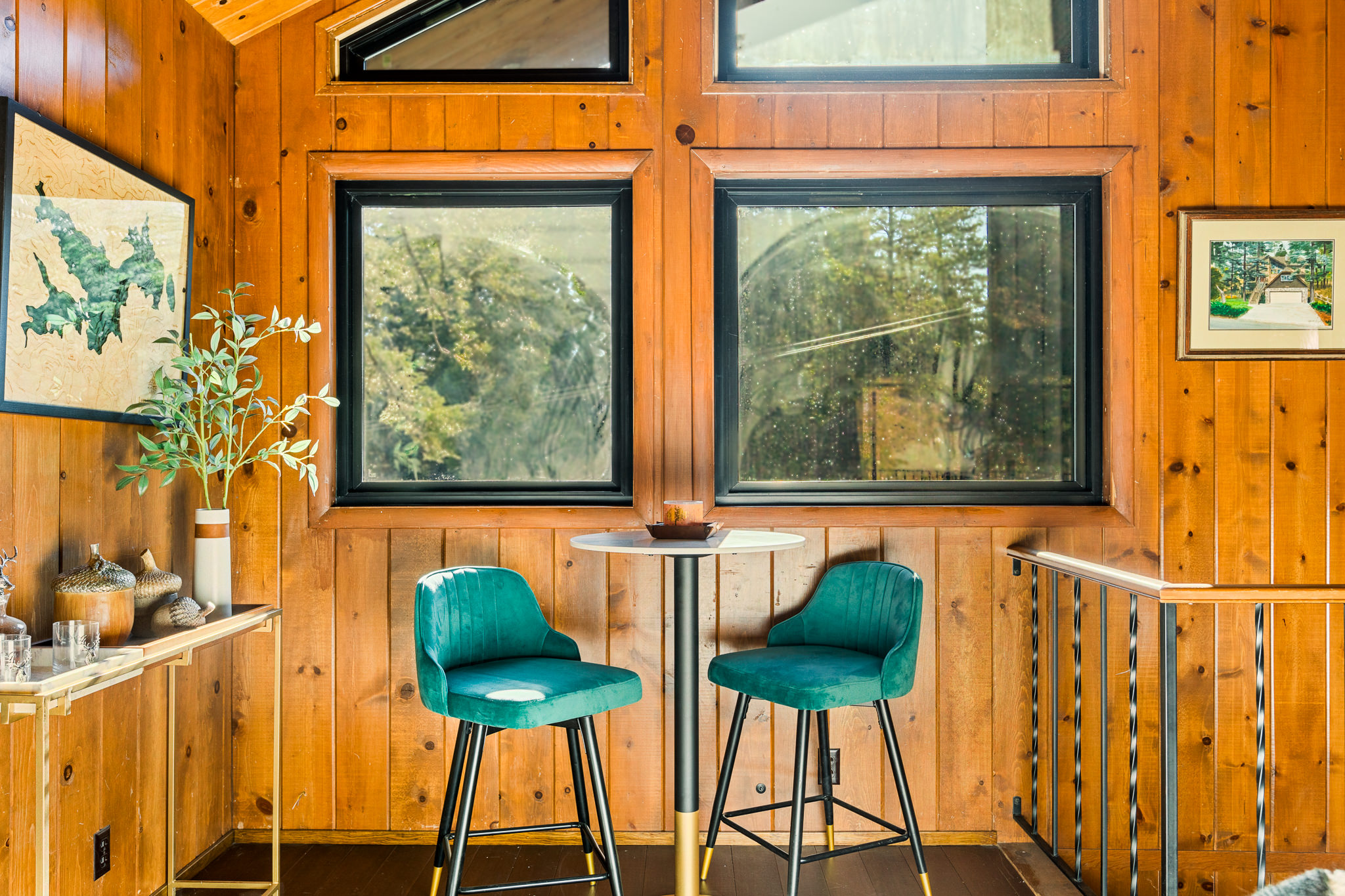 Adjacent to the main living room, there's a quaint seating area where you can unwind with a glass of chilled whisky or uncork a bottle of wine.