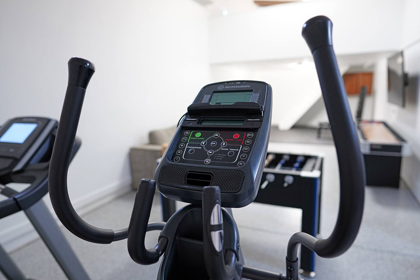 Air conditioned and heated garage space includes a NordicTrack treadmill, an elliptical machine, and a weight rack with 5lb. dumbbells all the way up to 50lbs.