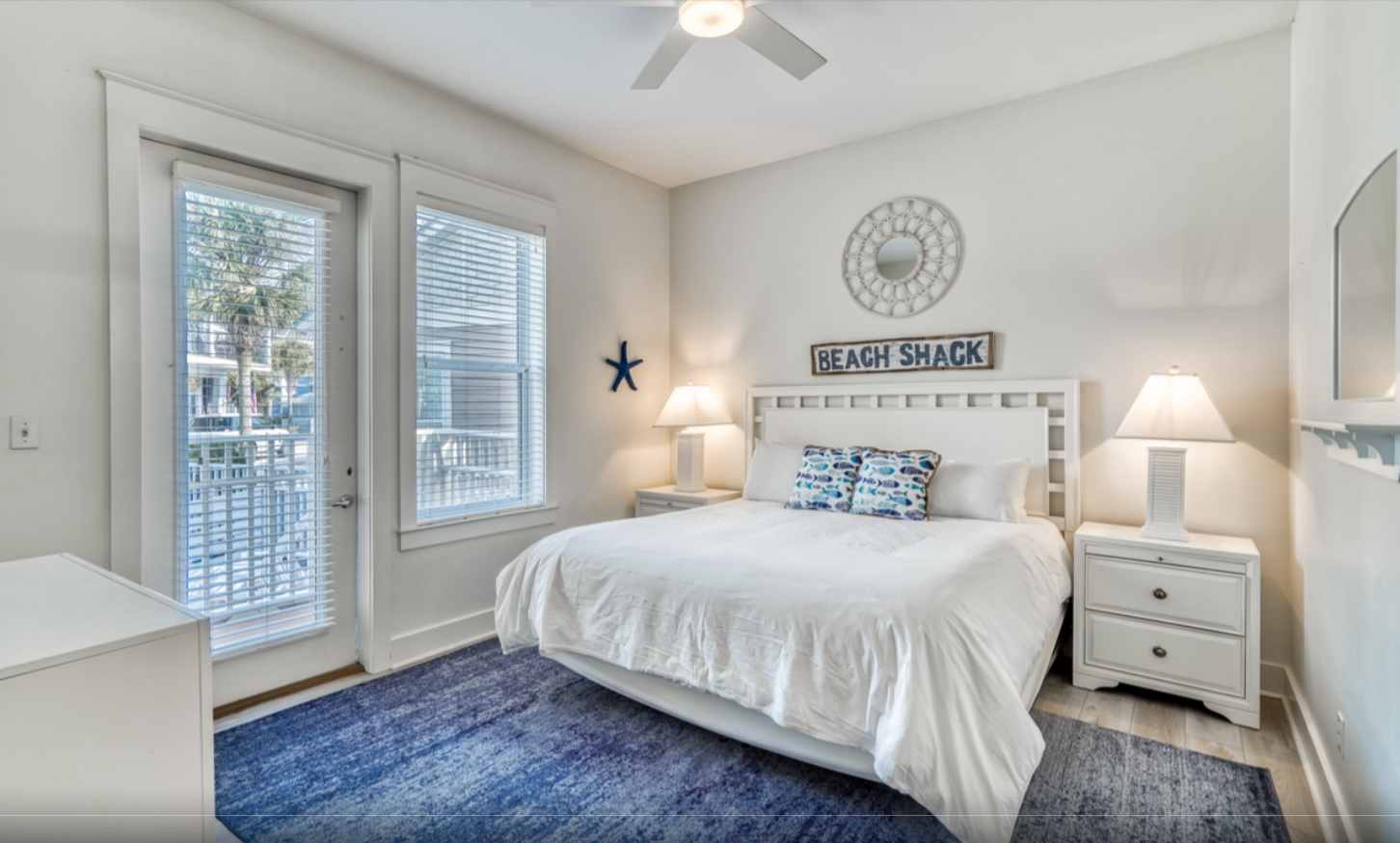 Primary Bedroom - 1st floor King Bed with private pool access &         en-suite bathroom