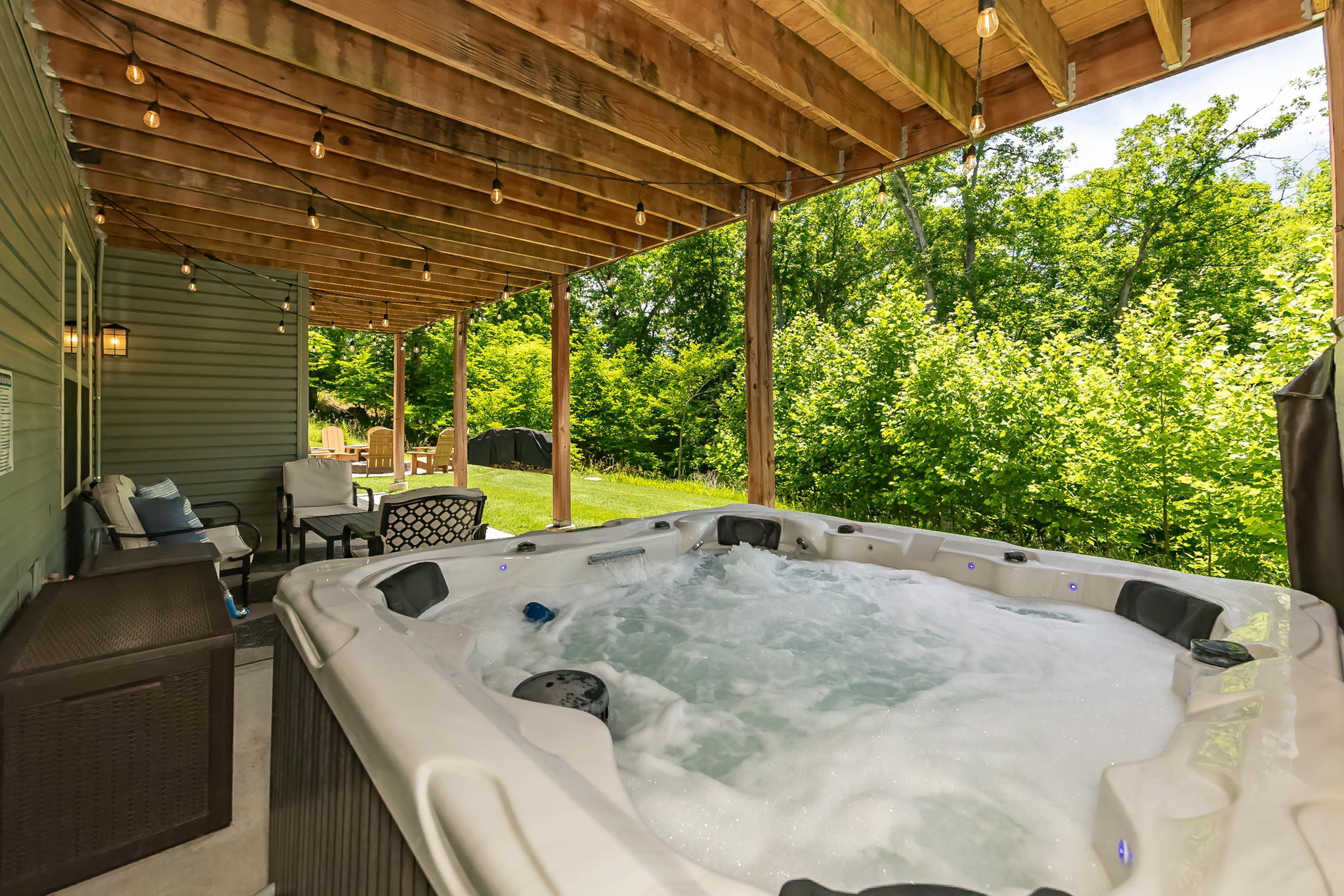 Relax in the hot tub while surrounded by nature.