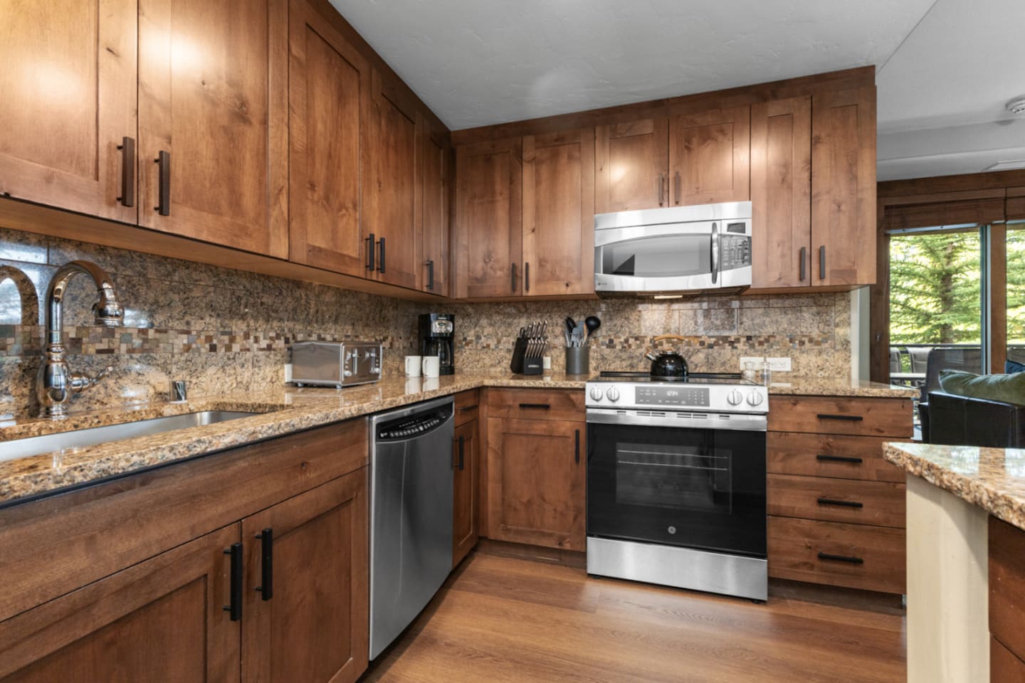 Kitchen with Electric Stove and Microwave