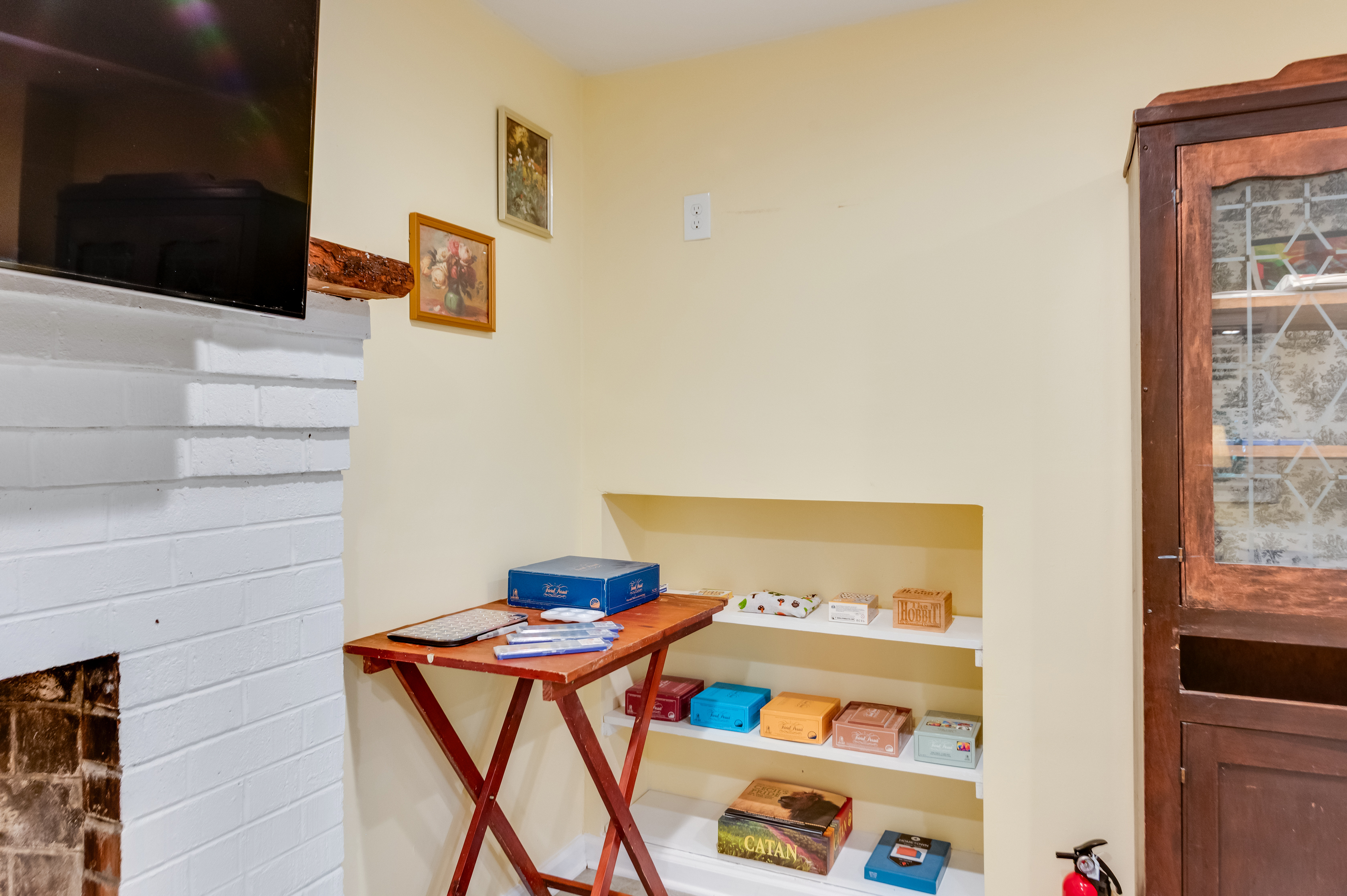 Downstairs Living Room: Enjoy a fun-filled retreat with classic board games and charming decor!