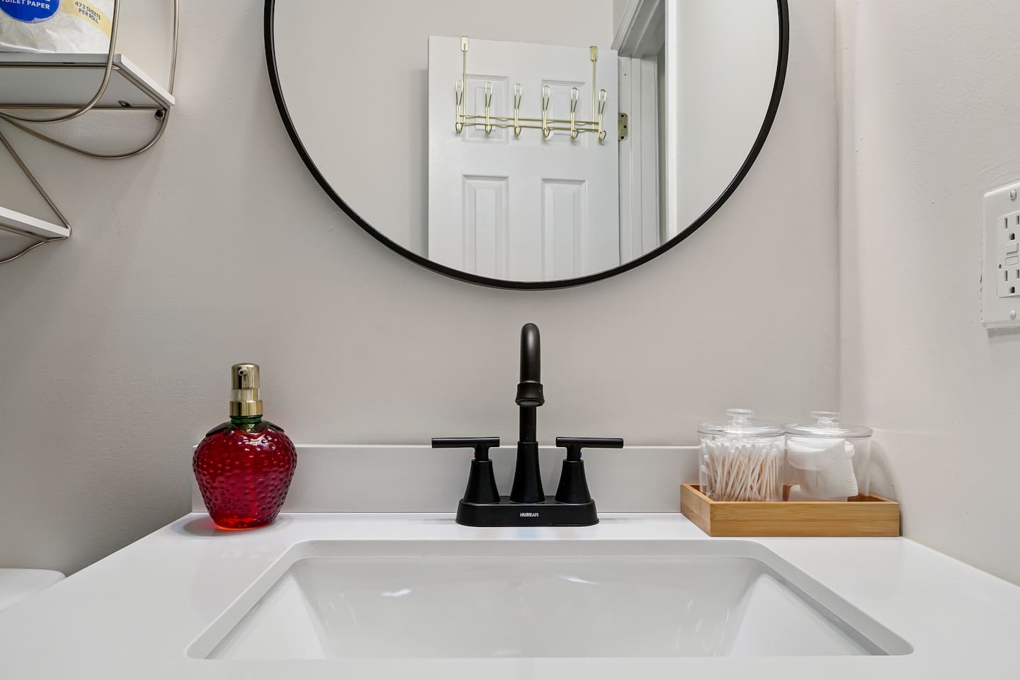 Full bathroom thoughtfully stocked with essentials including body wash, shampoo, conditioner, cotton pads, and Q-tips everything you need for a comfortable and refreshing stay.