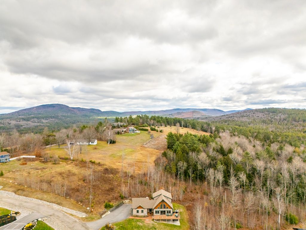 See the full property and surroundings from above.