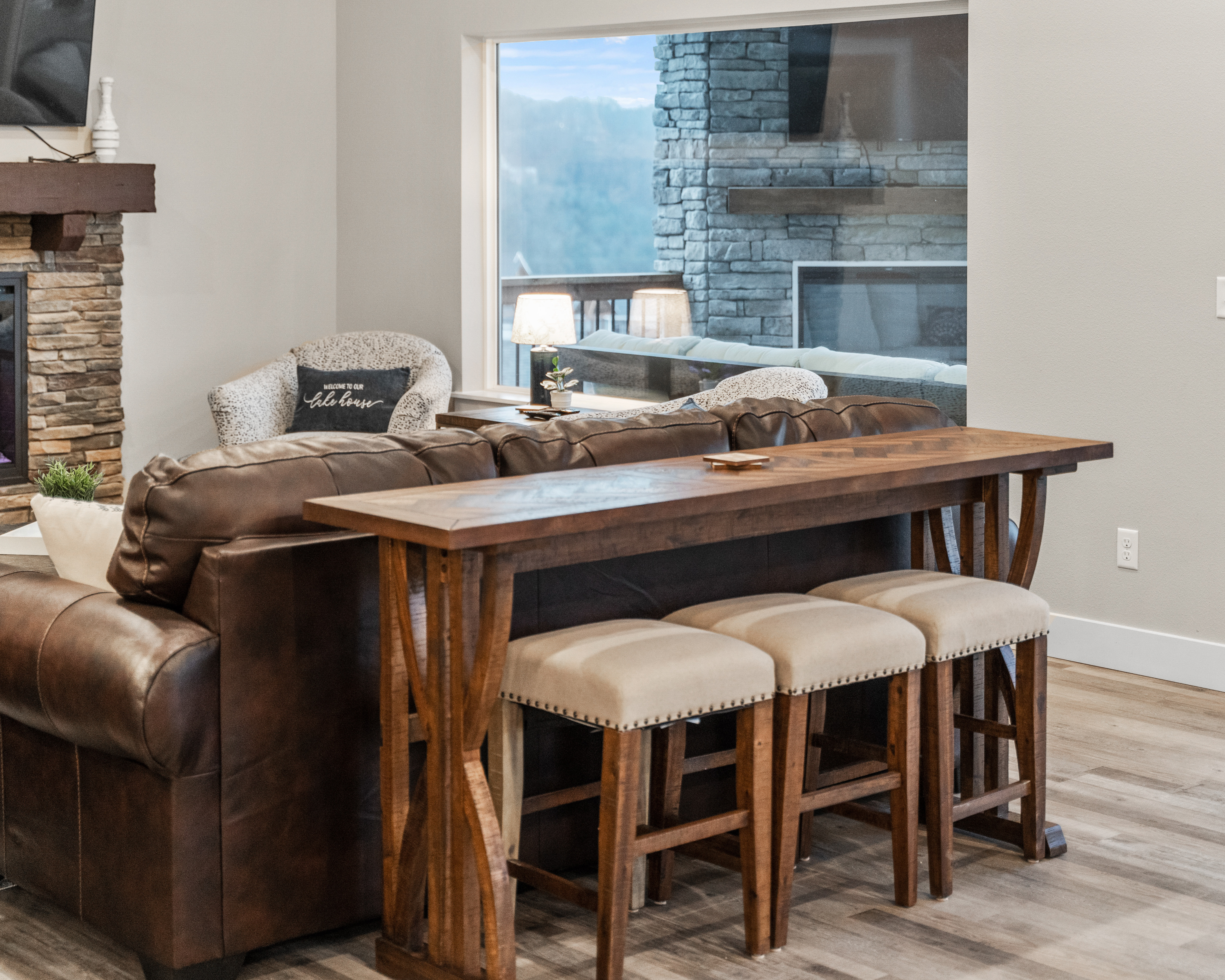 There is also a small table behind the couch that seats 3.