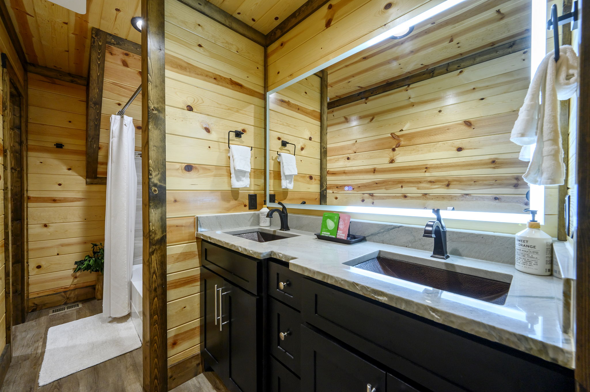 Bright, modern, and refreshing—this ensuite bathroom features a spacious walk-in shower, sleek finishes, and everything you need to unwind in comfort