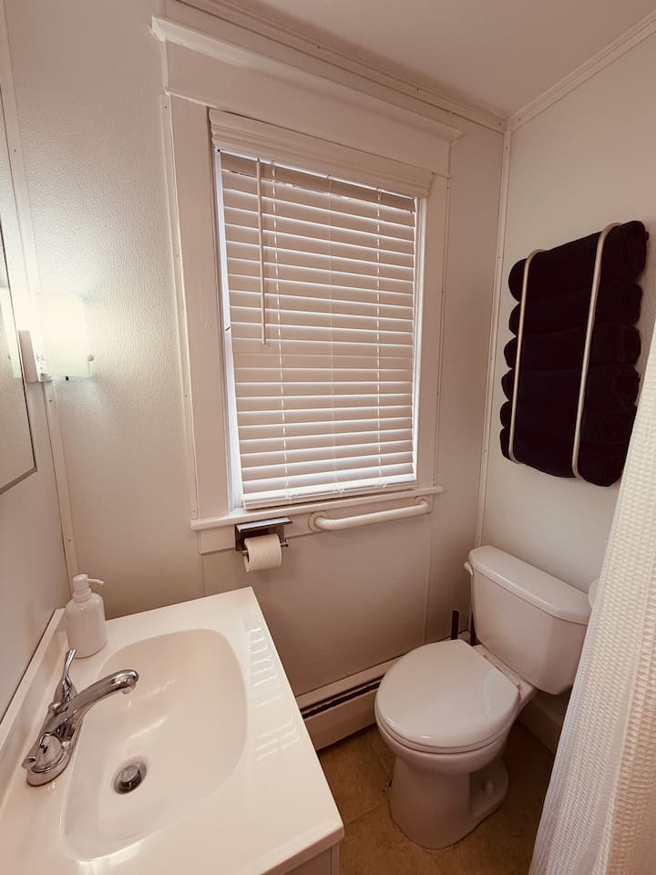 Deep clawfoot tub/shower combo — great for soaking after a long walk (note: tub wall requires a step up).”