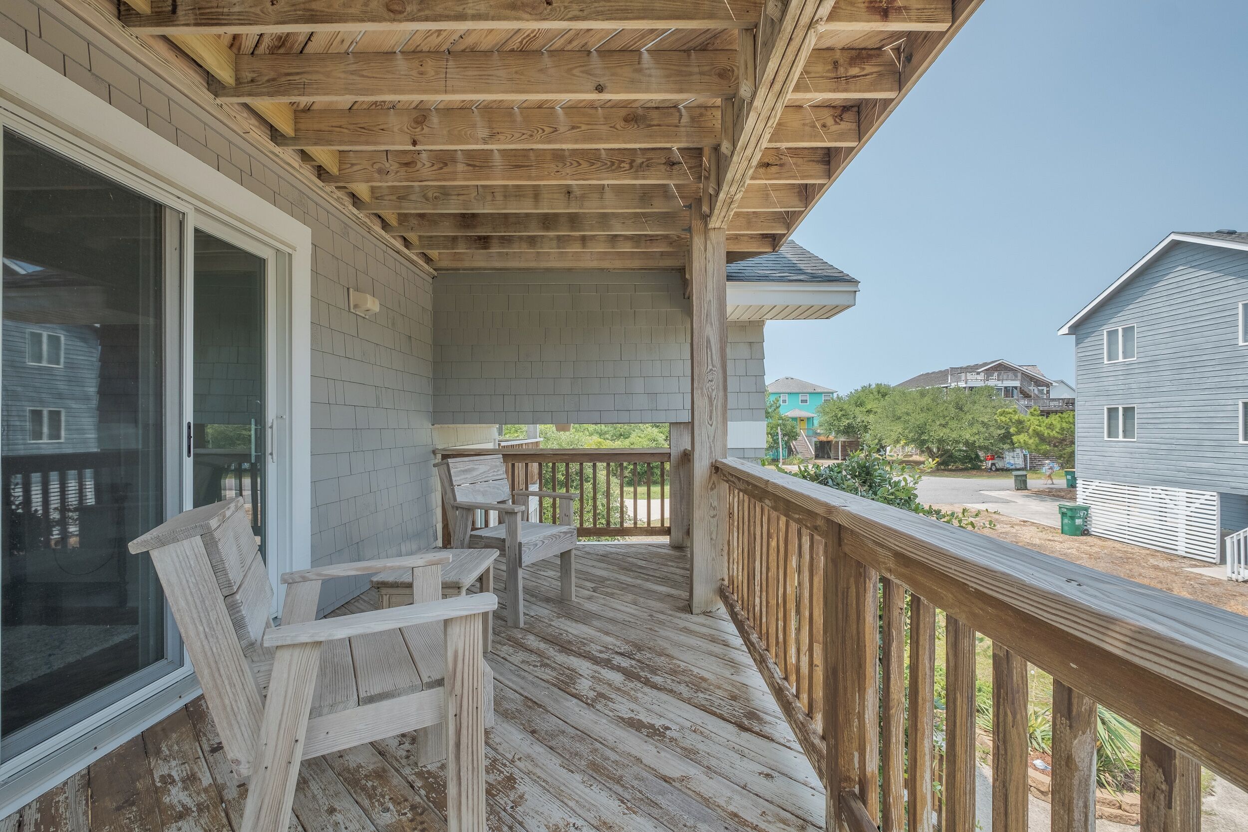Lower-level patio with direct outdoor access and seating.