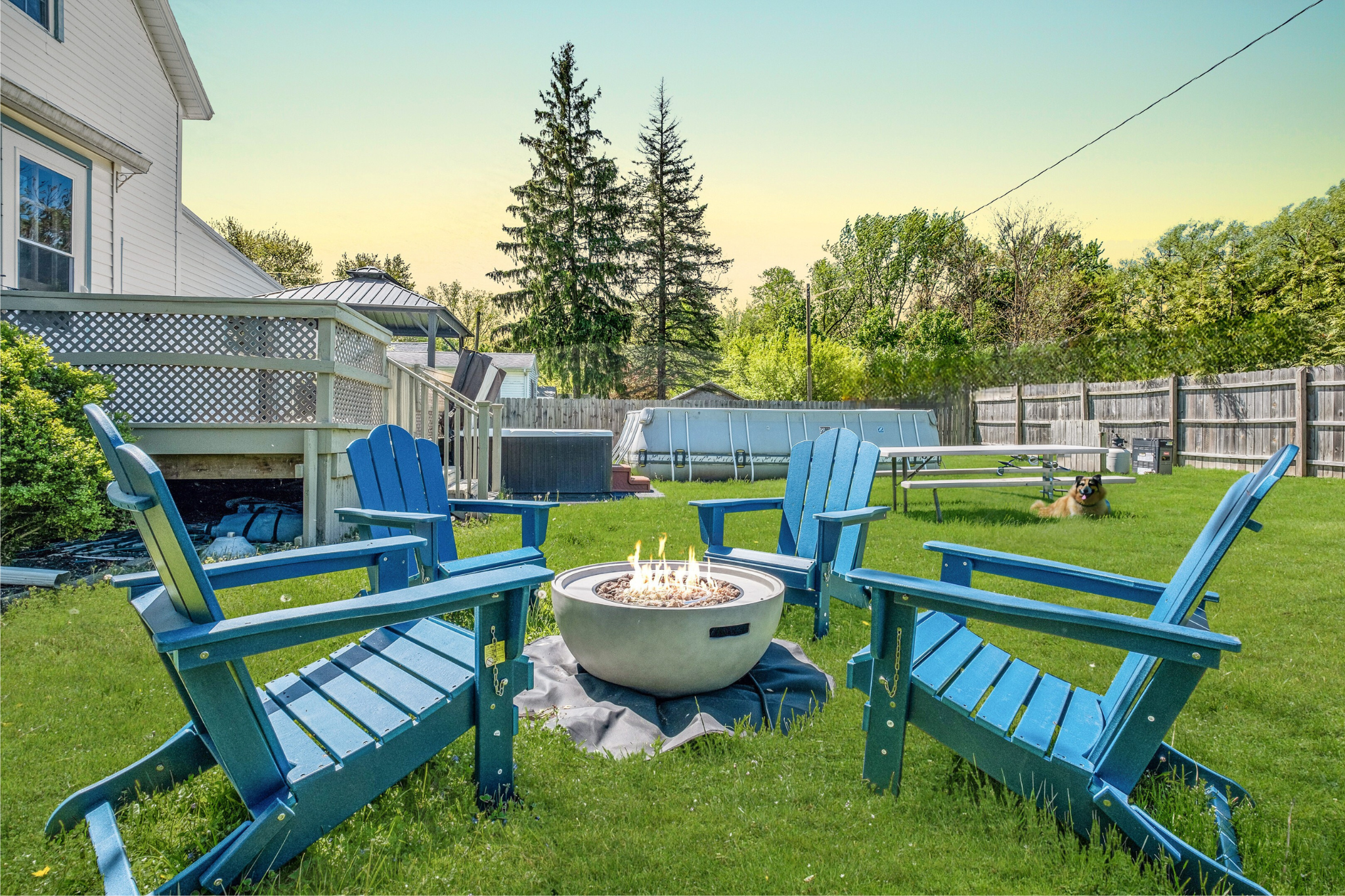 Settle into the backyard as the kids run free in the fenced yard and the grown ups unwind by the fire pit.