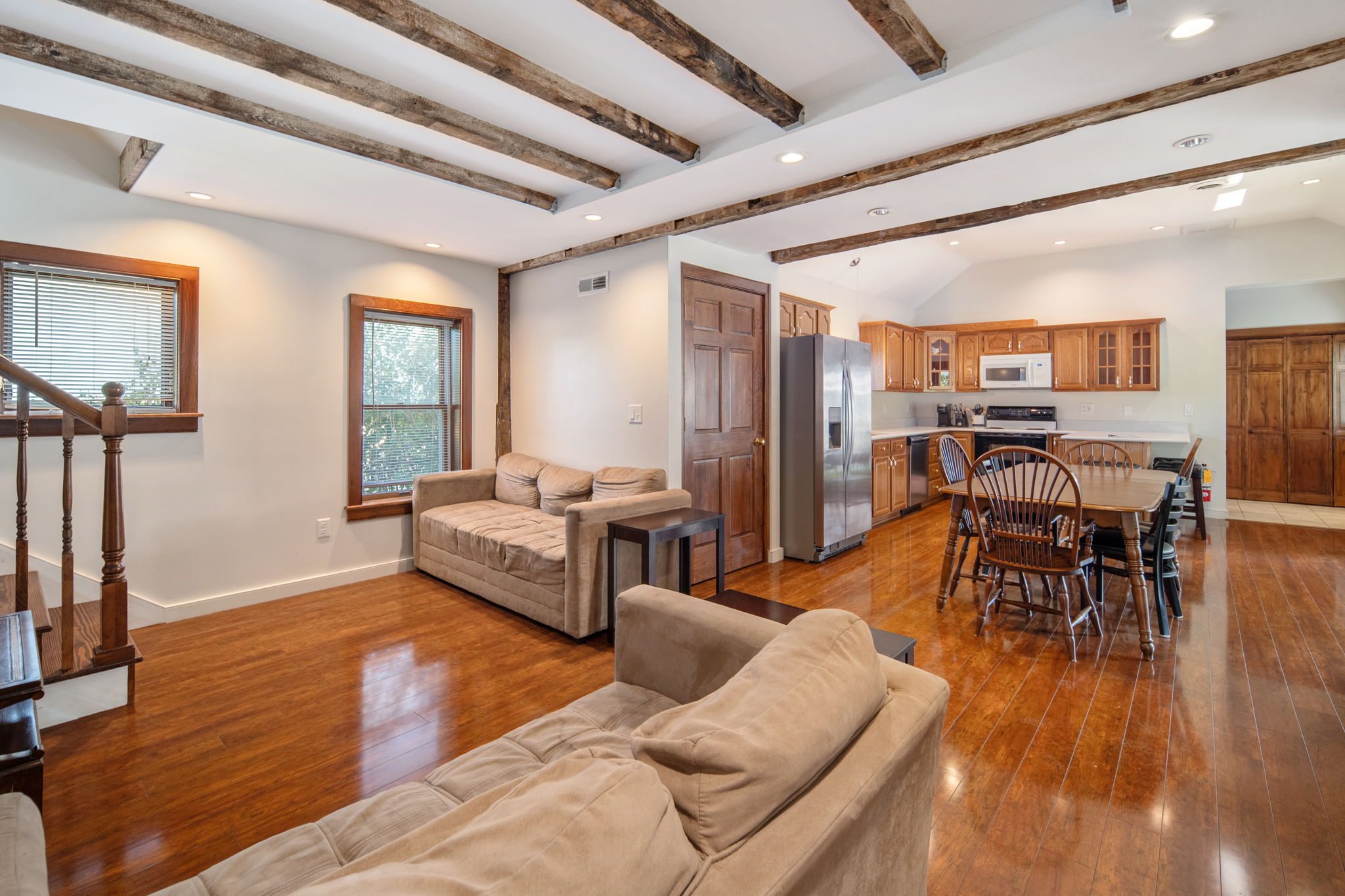 An open layout keeps the living, dining, and kitchen spaces connected.