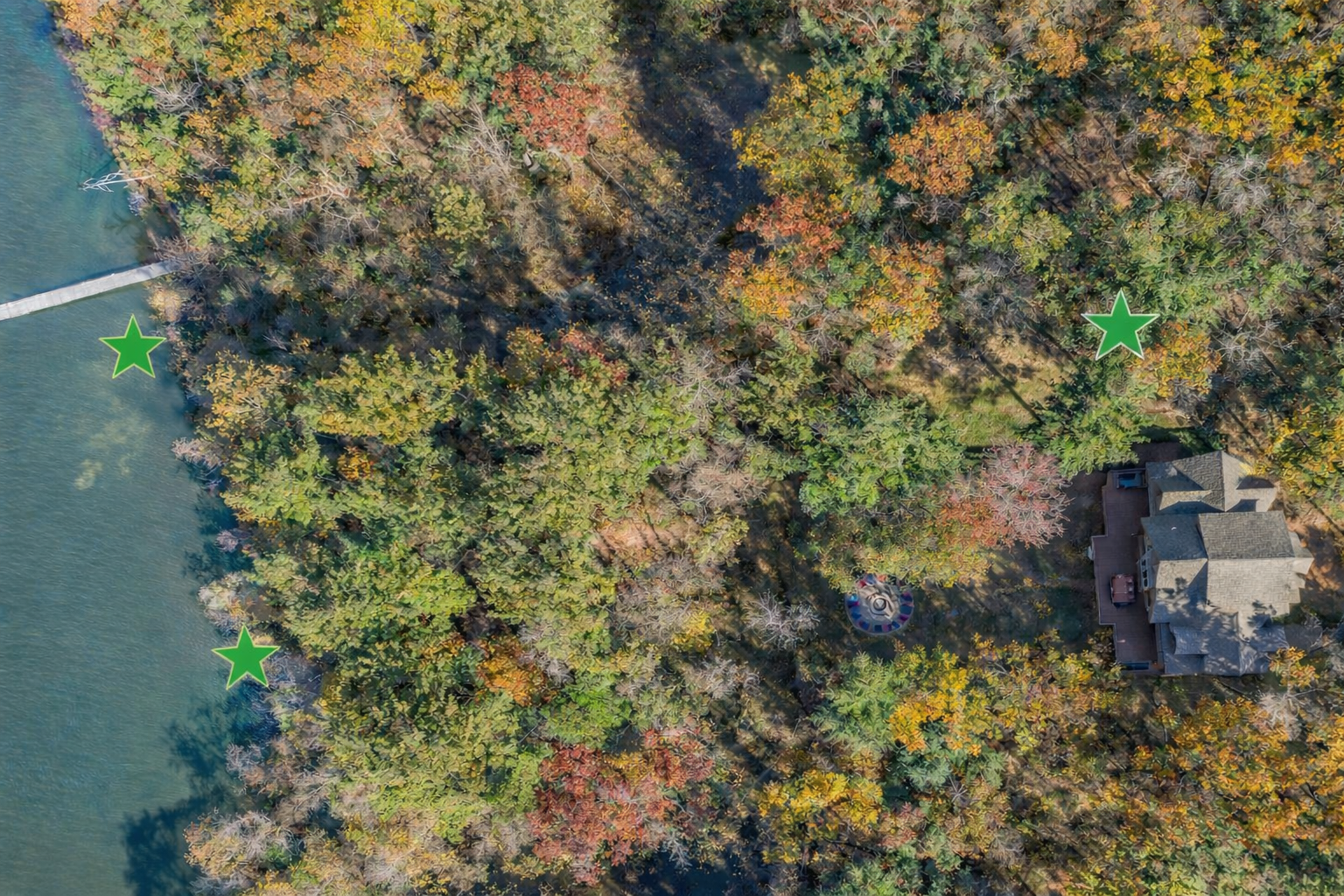 Aerial view of proximity to dock and beach. Note the home is on the Lake but there is a short walk to access. Home, pier, and beach are all marked by green stars for reference.