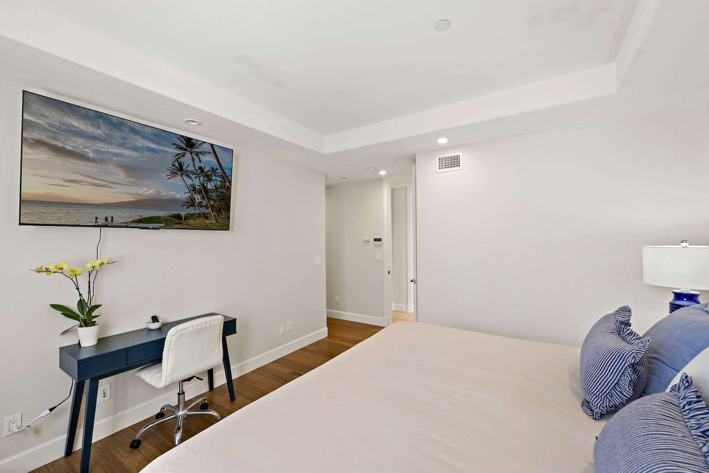 The bedroom also has a dedicated work space and a 65" TV with plenty of streaming channels for movie night or binge watching :)