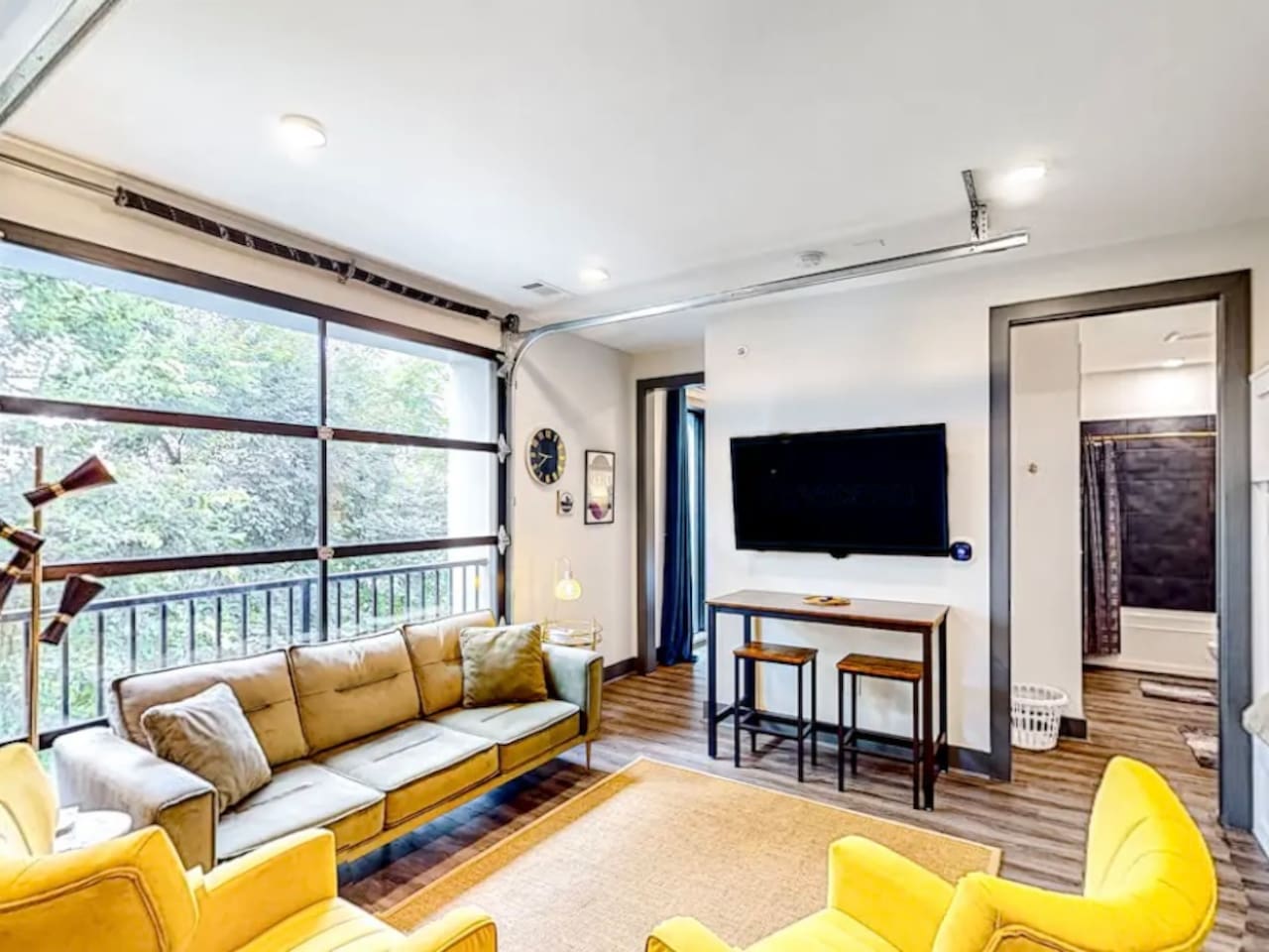 Living Room: Modern retreat with bright views, comfy seating, and a stylish dining area. Perfect for relaxation!