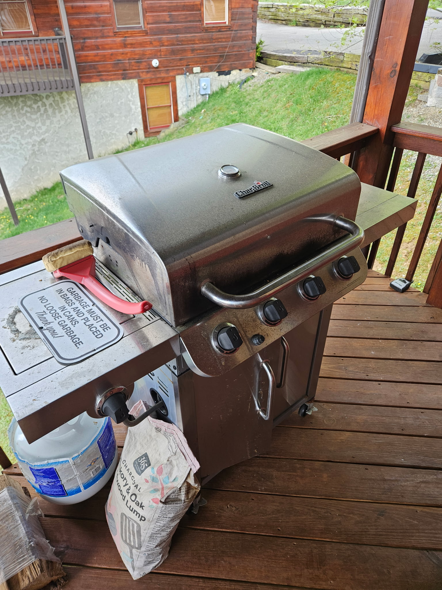 Gas grill on the deck makes outdoor meals easy without missing the mountain atmosphere.