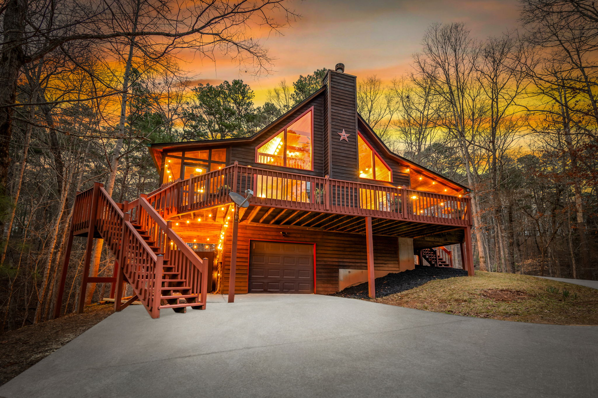 The front exterior of the property offers a warm and welcoming first impression, featuring charming architectural details and well-maintained surroundings.