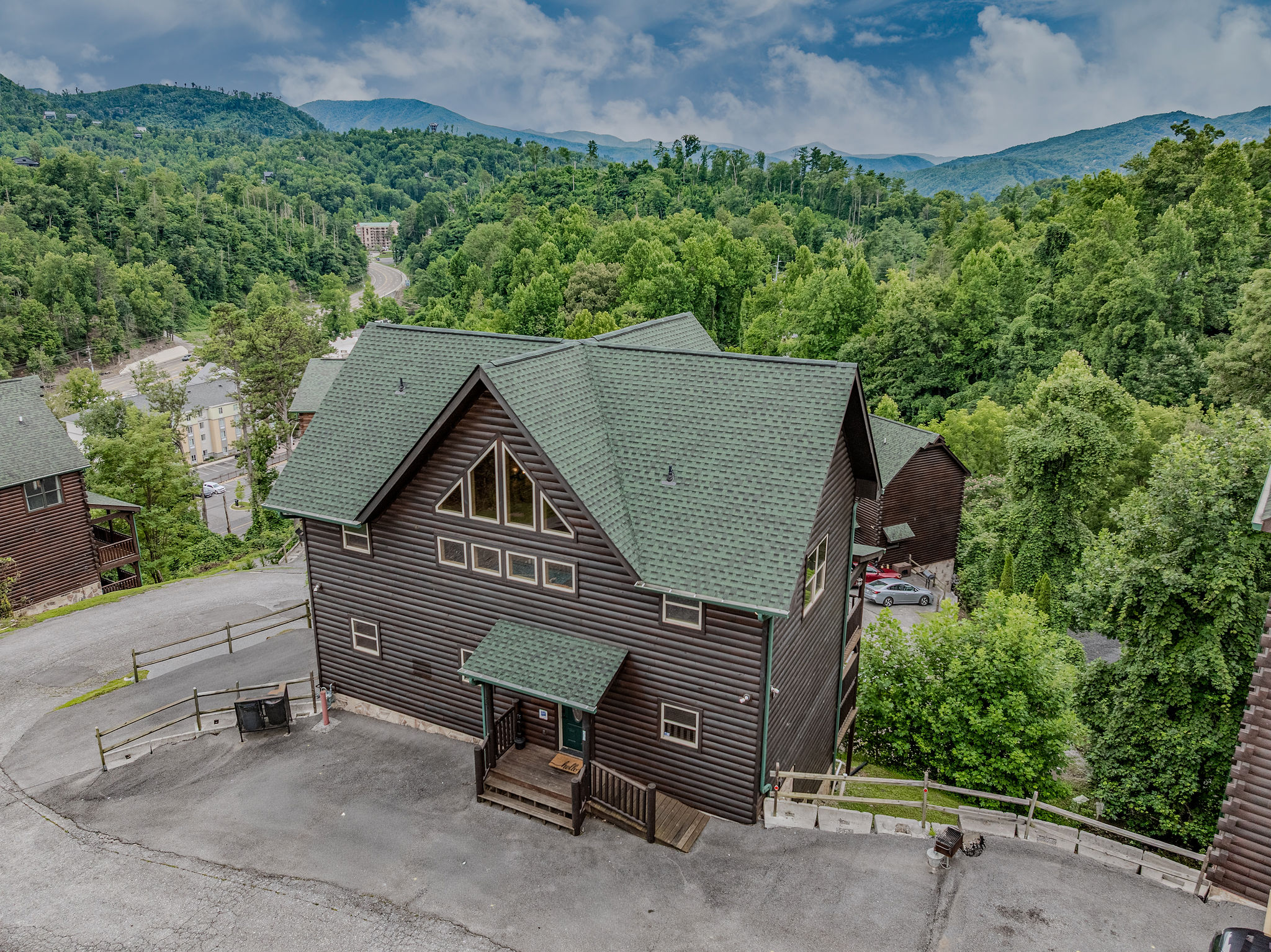 The exterior arrival sets the tone for a private Smoky Mountain retreat made for families, friends, and groups.