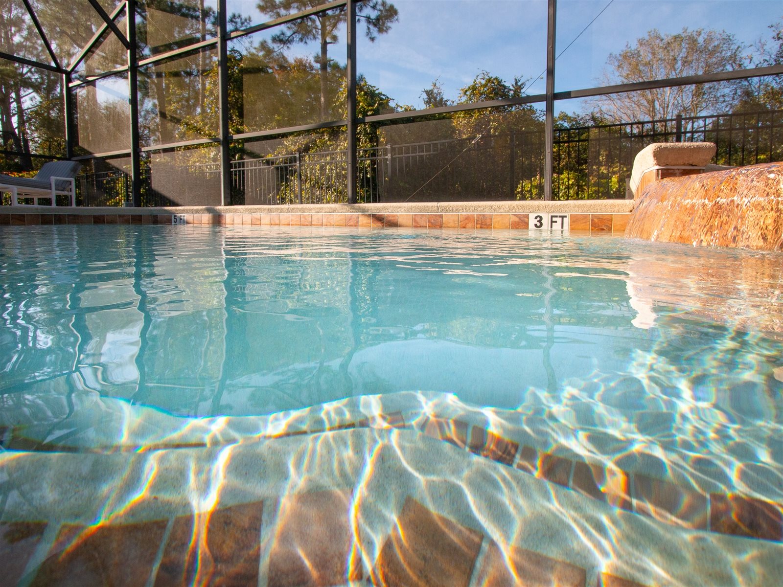 Relax by your private screened patio pool