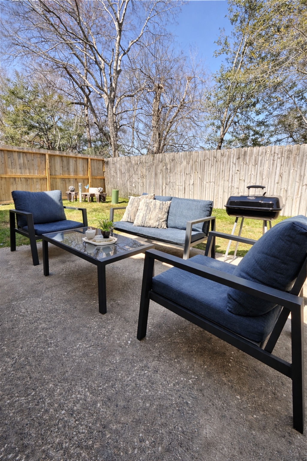 Spacious outdoor area for BBQs, games, and relaxation.