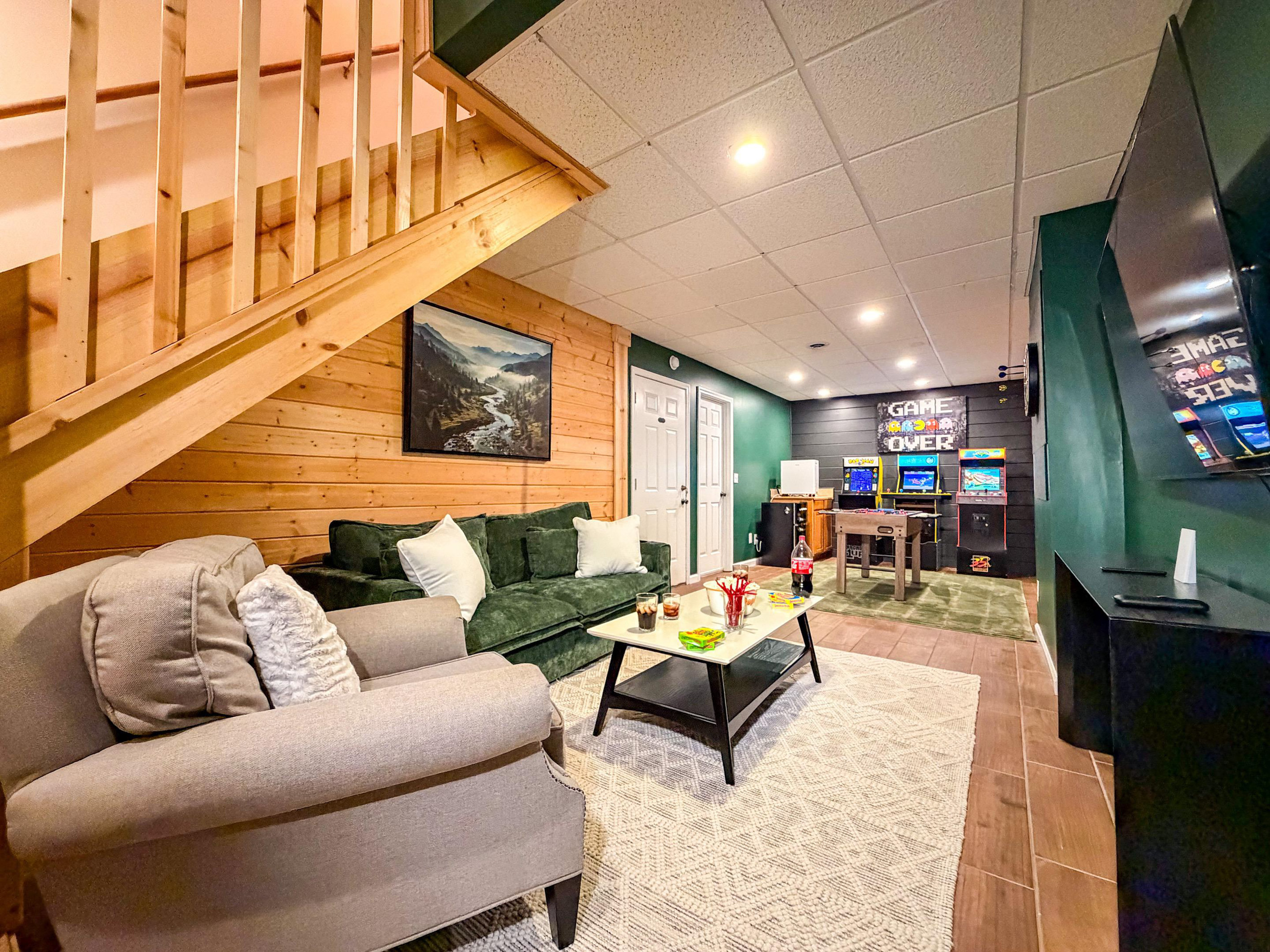 The basement features a game room, Roku TV for enjoying a good movie. 