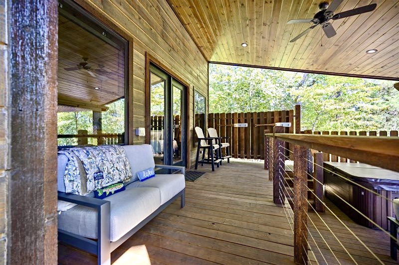 Multiple decks overlooking the pond create the ultimate setting for morning coffee or sunset drinks.