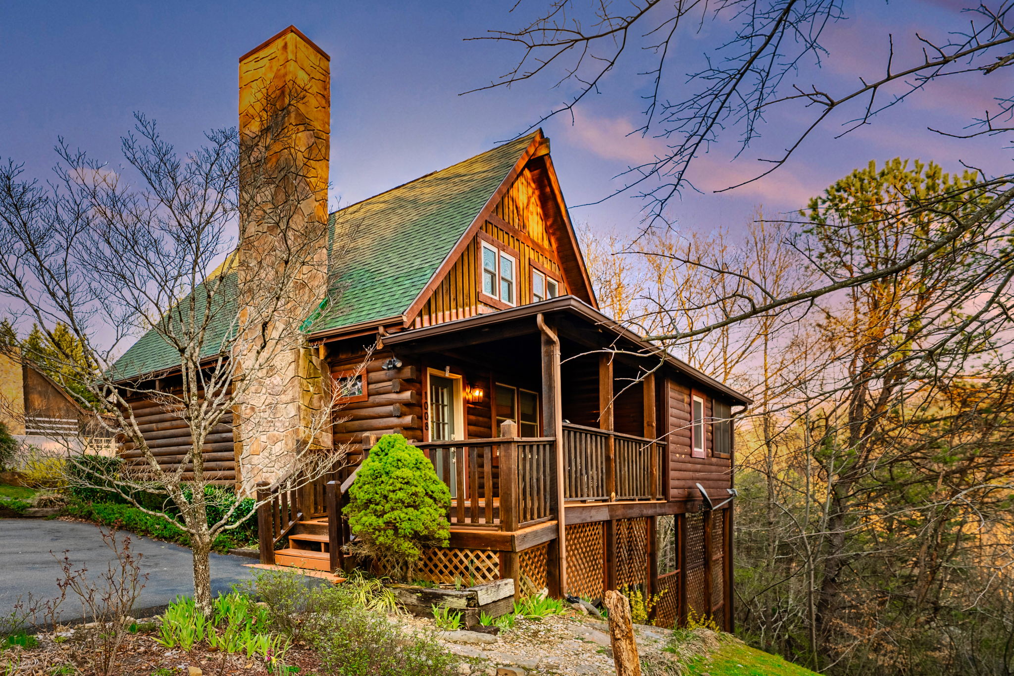 Nestled within the majestic Smokey Mountain forest, the homey cabin awaits your arrival. 